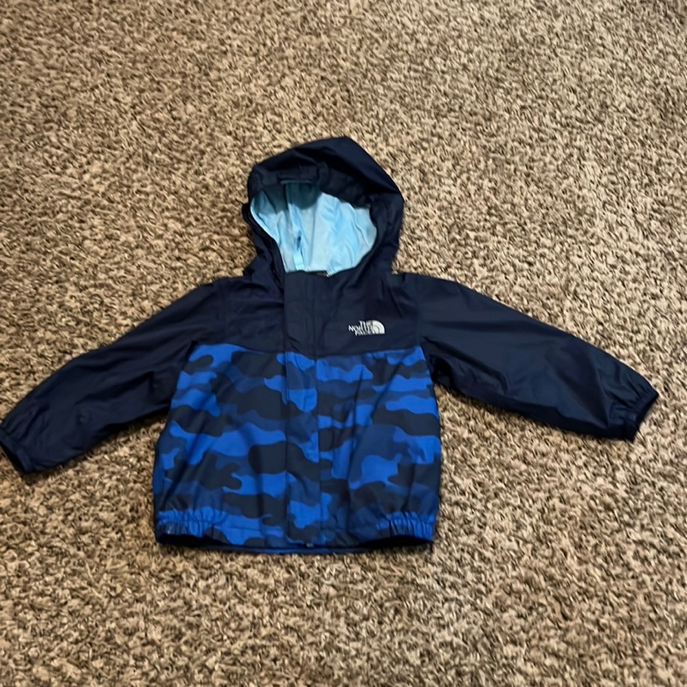 Like new The North Face wind/rain jacket 12-18 months